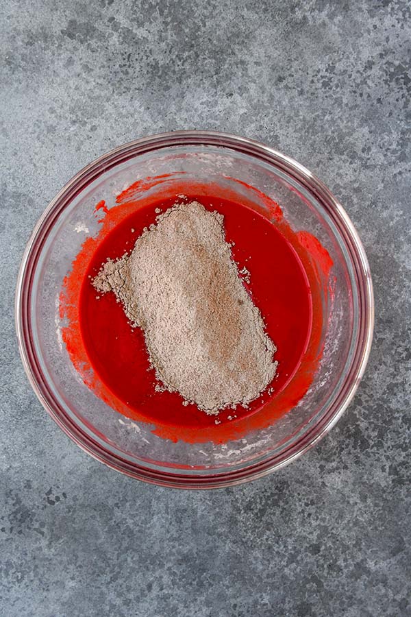 Step four is the dry ingredients being added into the wet ingredients.