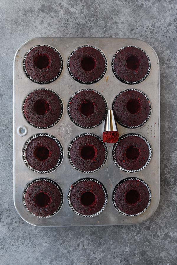 Step six is the removal of some of the cake from the cupcakes.