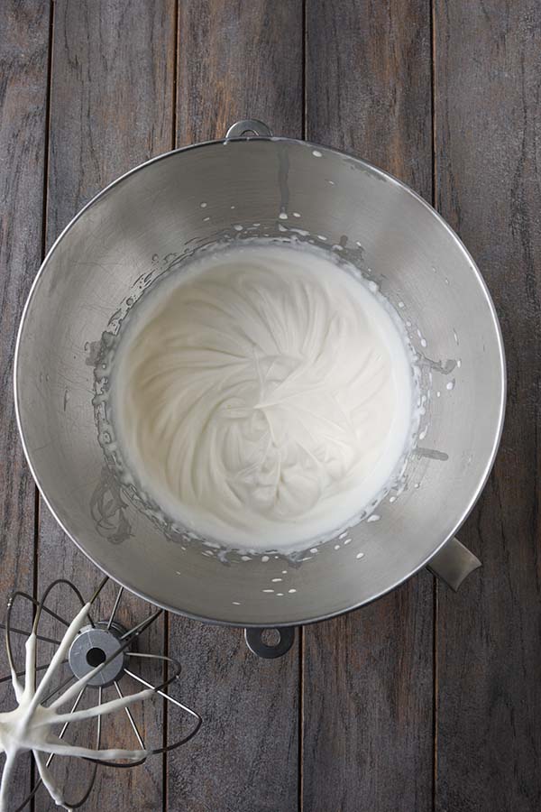 Step four is the finished whipped cream in the mixing bowl with the whisk attachment.